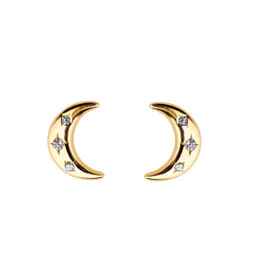 Gold crescent moon earrings with small diamonds on a white background
