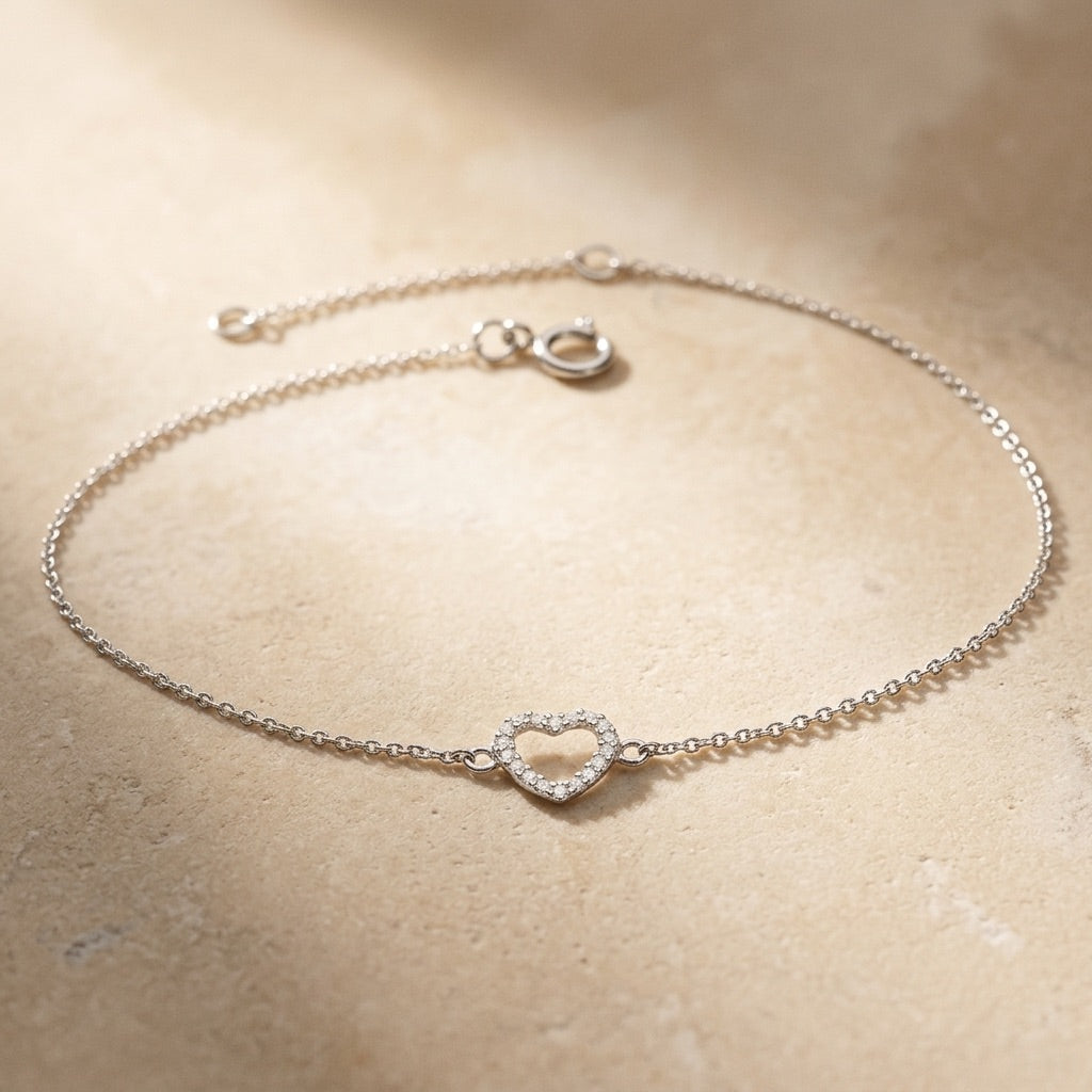 Open Heart Cubic Zirconia Braceleton a beige background