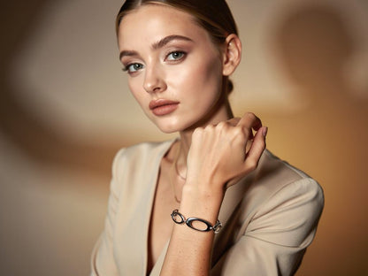 Woman wearing a bracelet with a blurred background