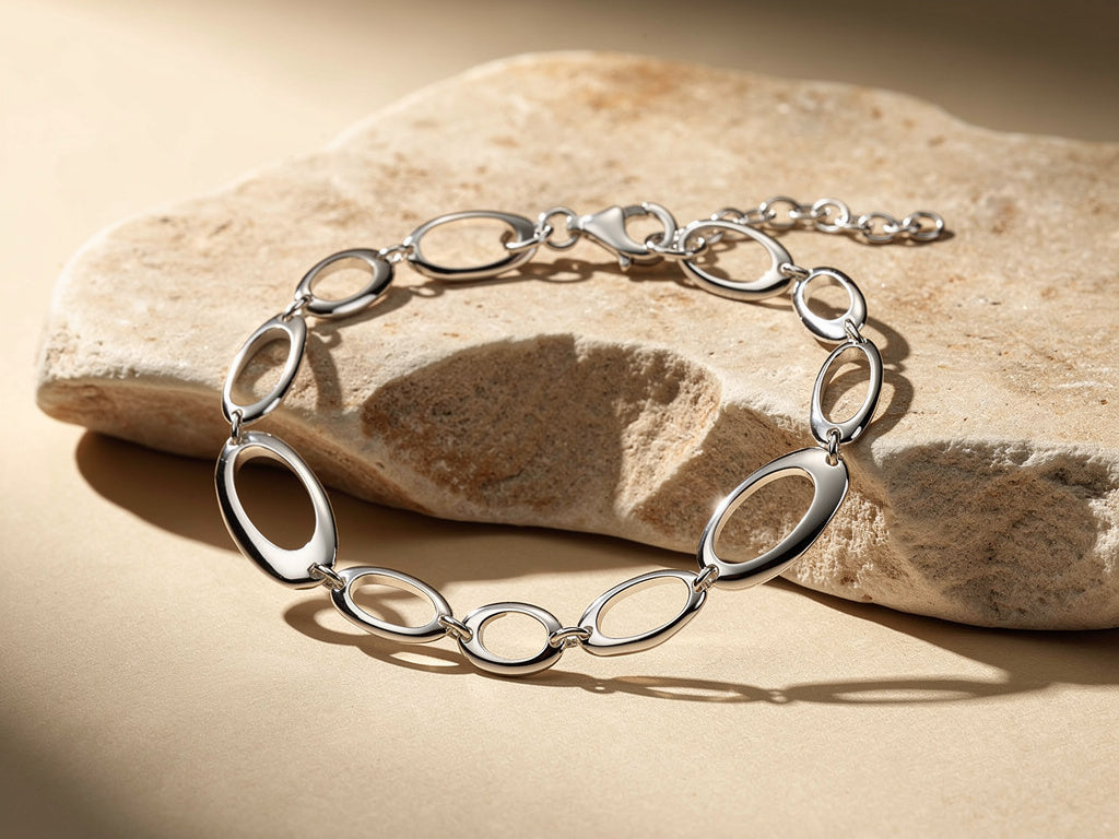 Silver bracelet on a stone surface
