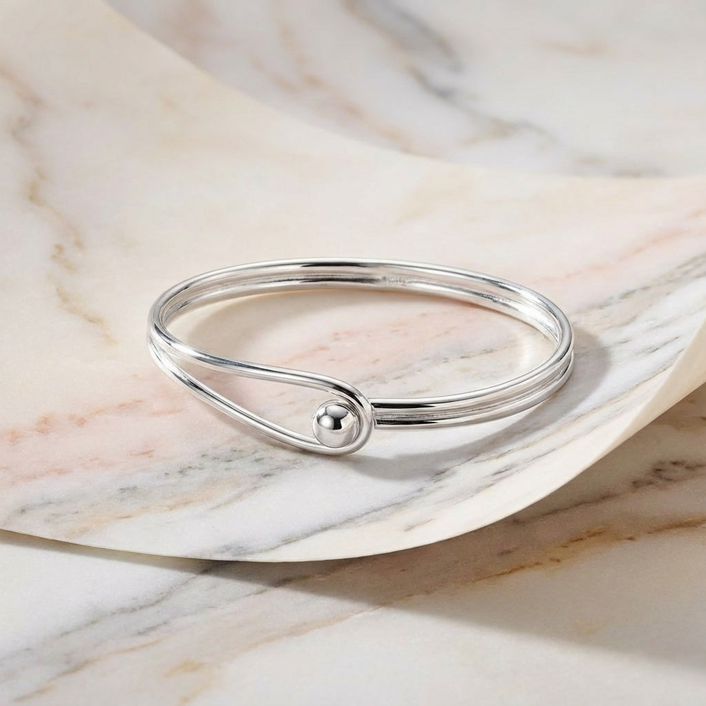 Oval Bangle with Feature Ball Clasp