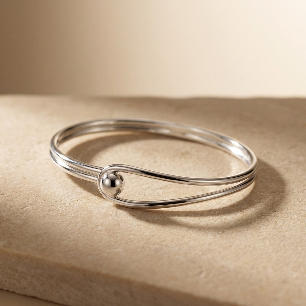 Oval Bangle with Feature Ball Clasp