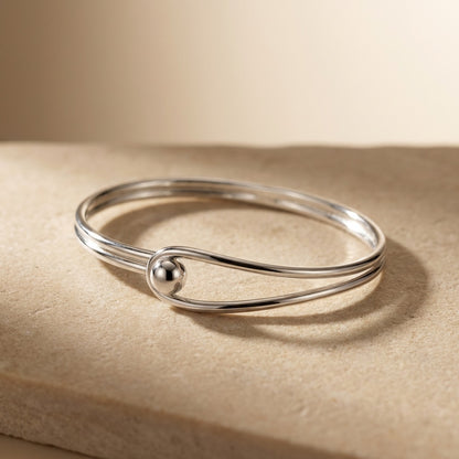 Oval Bangle with Feature Ball Clasp