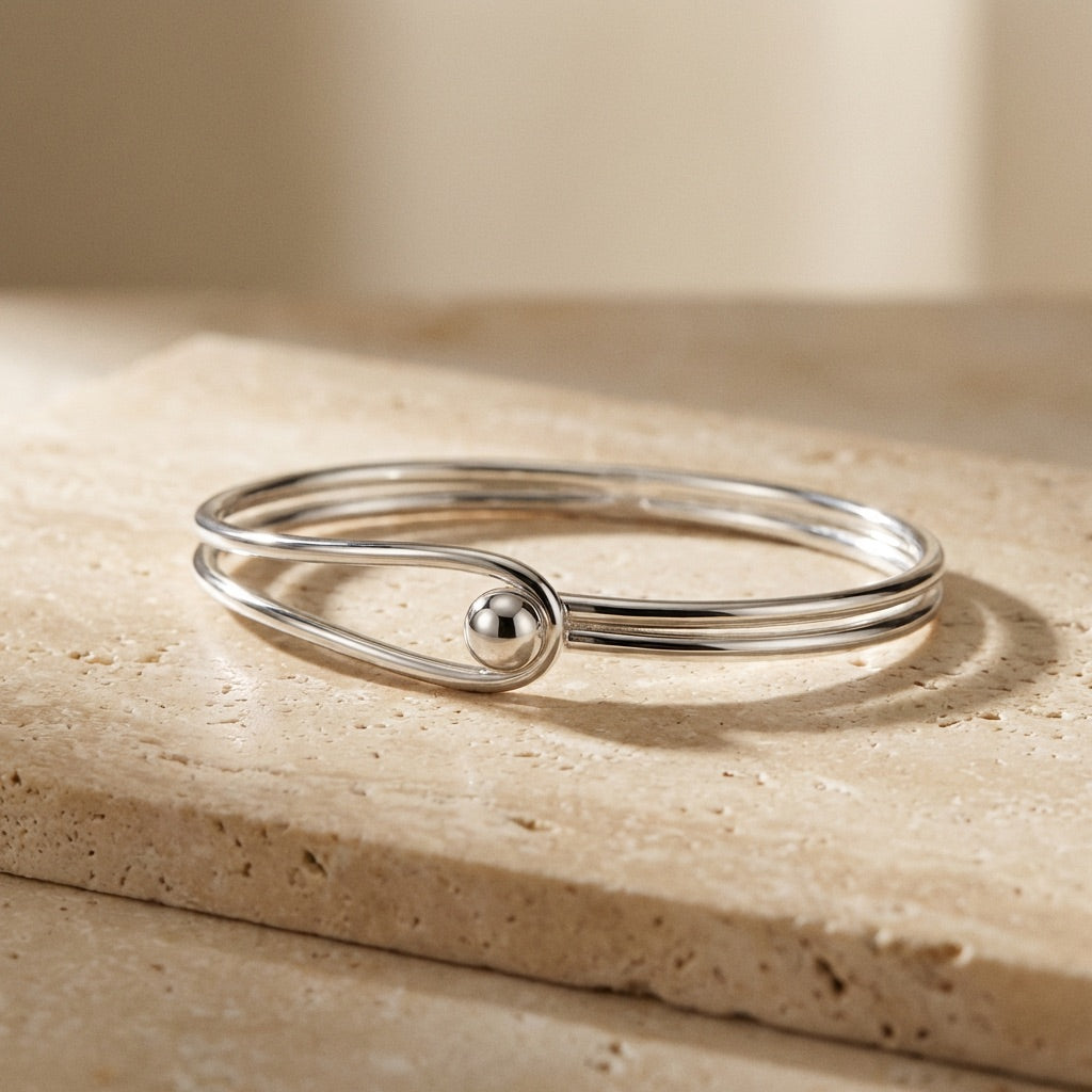 Oval Bangle with Feature Ball Clasp