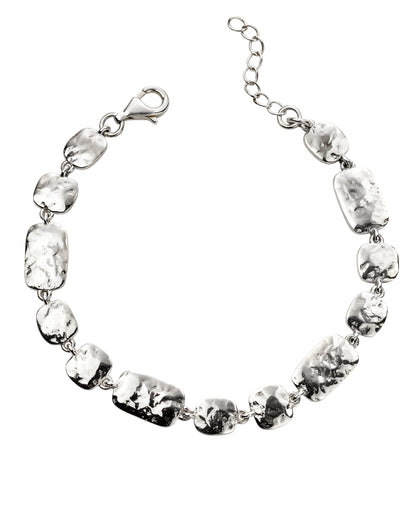 Silver bracelet with clear gemstones on a white background - by Alpha Bijoux