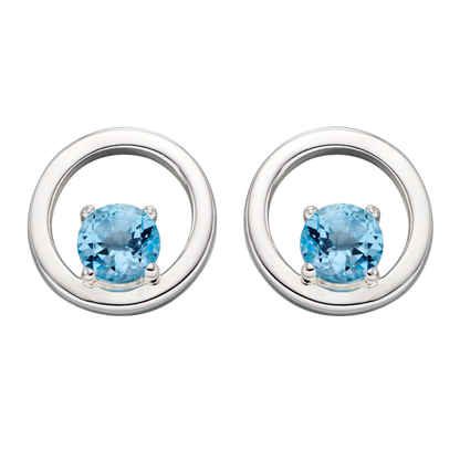 Open Circle Earrings with Blue Topaz on a white background