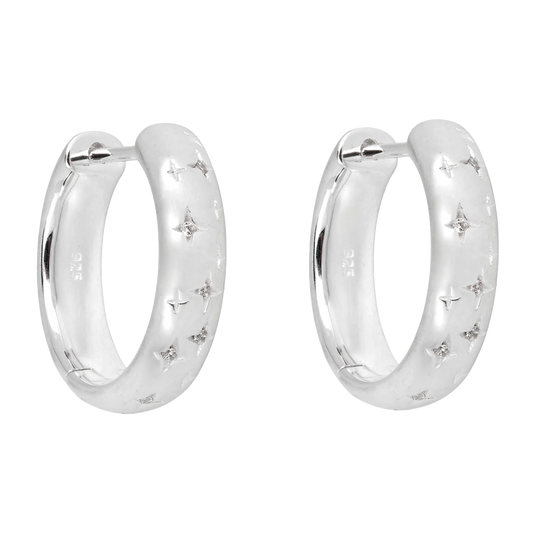 Silver hoop earrings with star designs on a white background