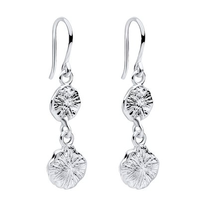 Pair of silver earrings with clear gemstones on a white background