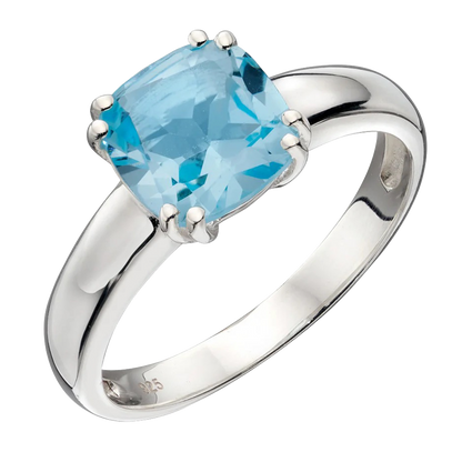 Cushion Cut Stone Ring with a blue gemstone on a white background