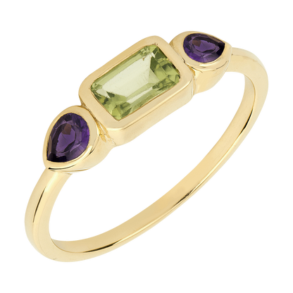 Gold ring with green and purple gemstones on a white background